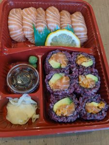 6 pieces of salmon sushi; 6 pieces of wild rice california roll