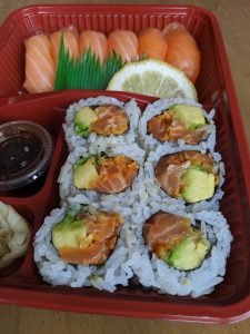 6 pieces of salmon sushi; 6 pieces of california roll